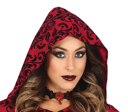 Person wearing a red hood with black patterns on a white background