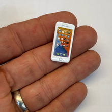 The World's Smallest i-Phone ~ Tiny Mobile Phone Joke