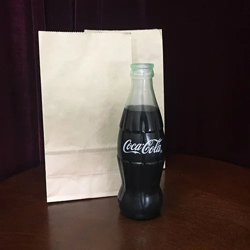 Botella de Coca-Cola que desaparece (llena)