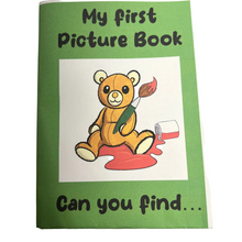 The image shows the cover of a children's picture book titled 'My First Picture Book'. It features a cute cartoon bear with a paintbrush, sitting in a splattered paint pot, against a green background.